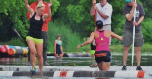 Log Rolling competition at the 2013 Midwest Log-Rolling Championship on Lake Wingra in Madison, Wisconsin.