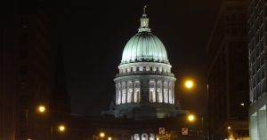 The Capitol building in downtown Madison WI at night.