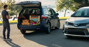 A pair of 2019 Toyota Sienna's being packed for a trip.