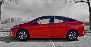 A red Toyota Prius Prime.