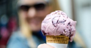 A luscious cone of blueberry ice cream.