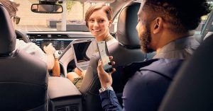 Coworkers carpooling to work in the 2019 Toyota Camry.