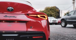 The back end of a red Toyota Mk5 Supra.