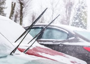 Reposition wiper blades off the windshield