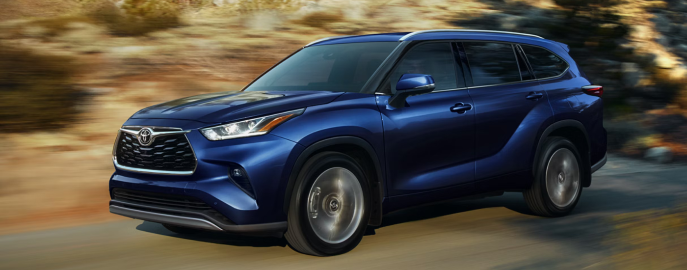Blue 2026 Toyota Highlander for sale in Madison on a test drive