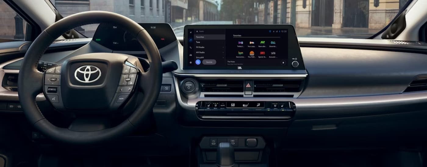 The black dash in a 2026 Toyota Prius for sale.